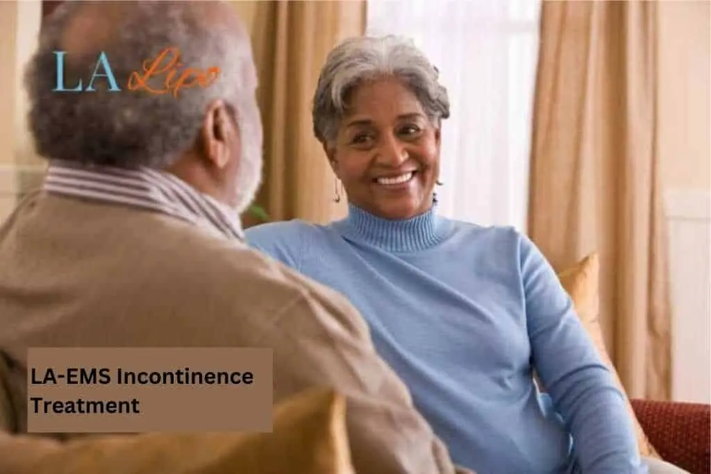 Couple sat smiling at each other - LA-EMS treatment Acton Green